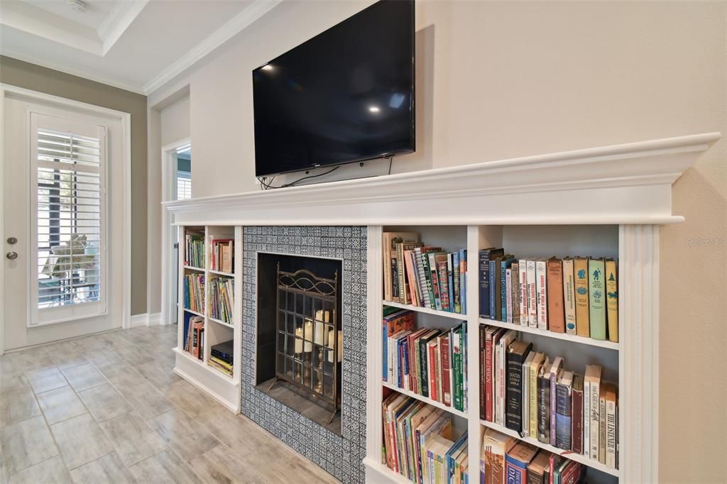 Custom faux fireplace and shelving unit in Family Room!
