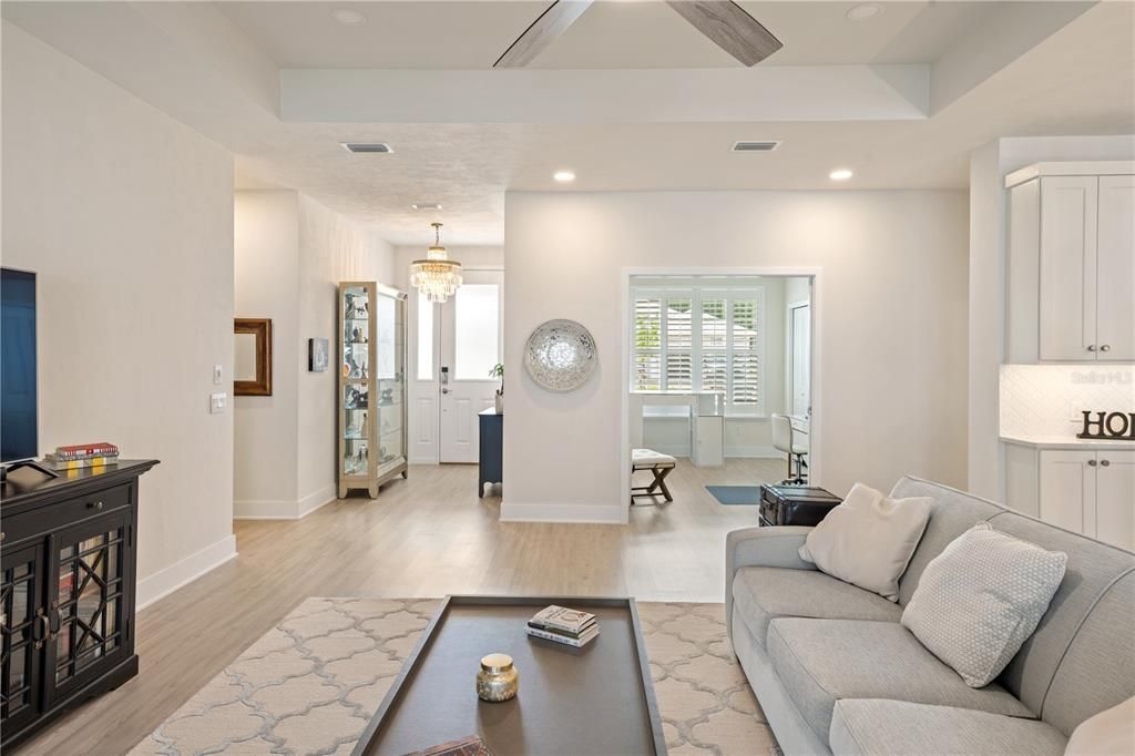 Looking towards the front of the home and the fourth bedroom/office.