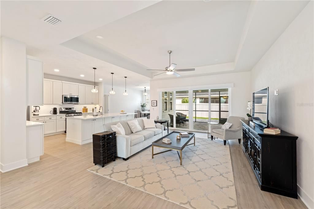 Full View of the living room, kitchen and dining area.