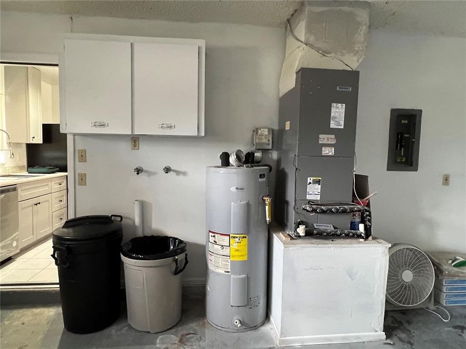 Washer/dryer hook-ups in garage, HVAC unit & water heater