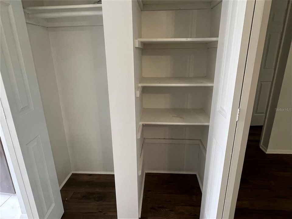 Guest closet & pantry between foyer & great room