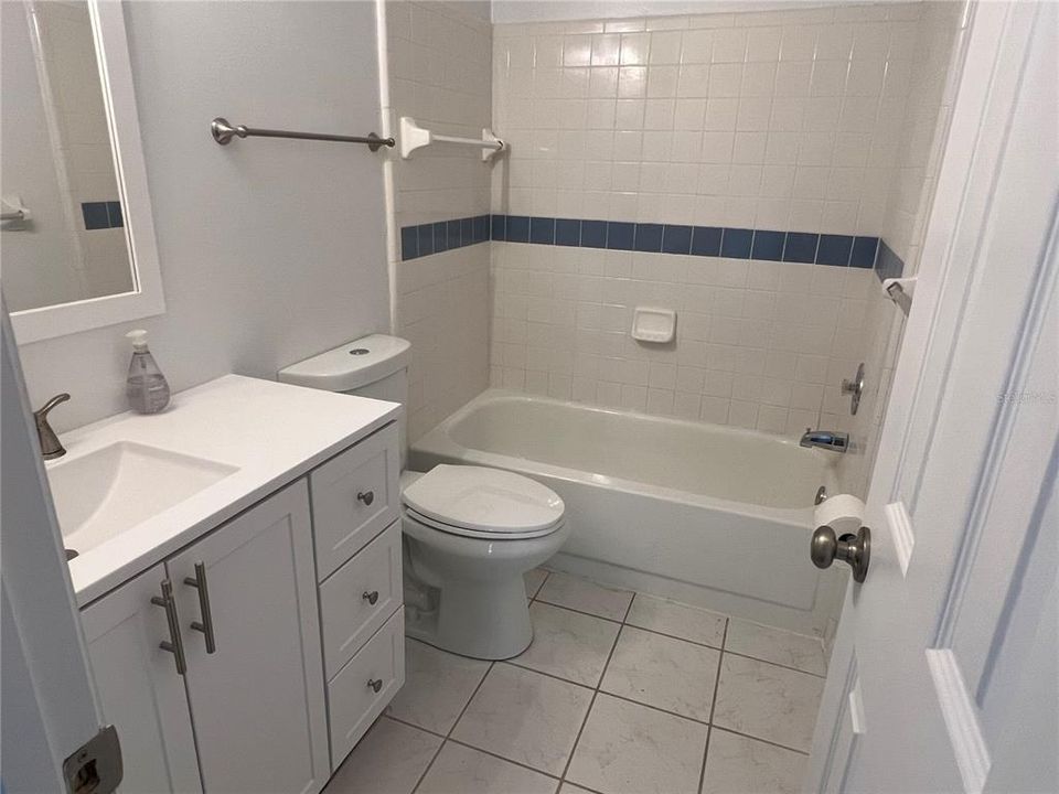 Bathroom w/new vanity, sink, hardware, toilet & light fixture