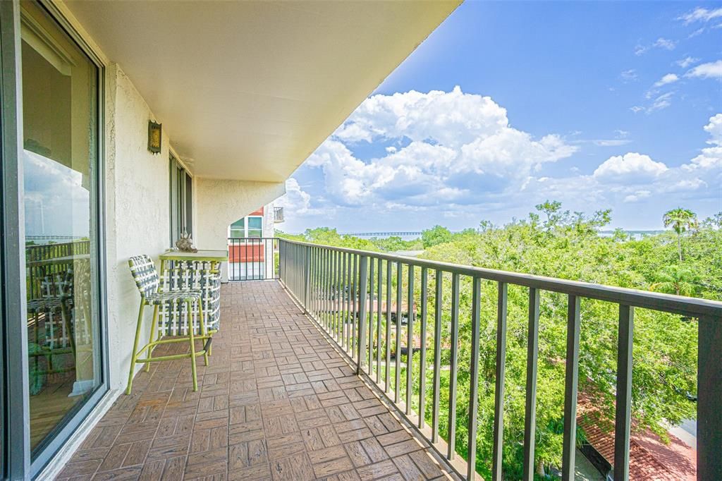 Corner Unit with expanded Balcony and a partial view of Tampa Bay