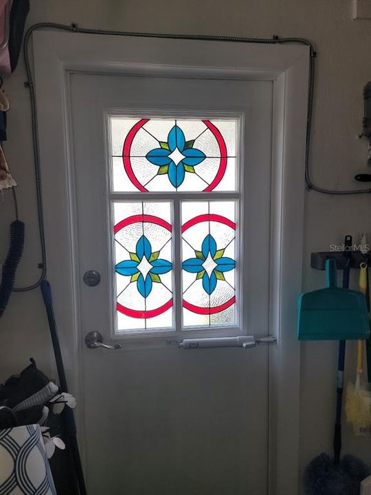 This is the garage side door with more custom Stained glass.
