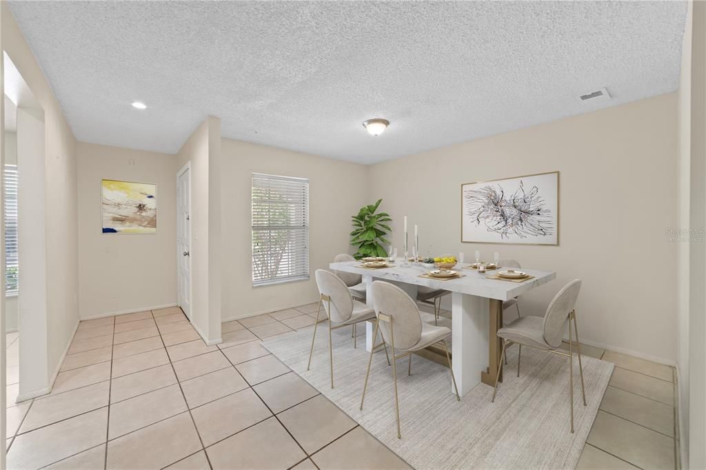 The condo boasts tile and luxury vinyl plank (LVP) flooring throughout, offering a light and bright low-maintenance living space! Virtually Staged.