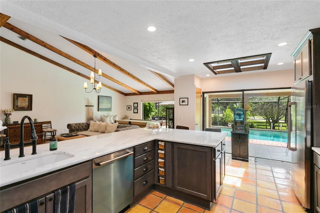The kitchen also provides direct access to the pool deck, making al fresco dining and entertaining a breeze.