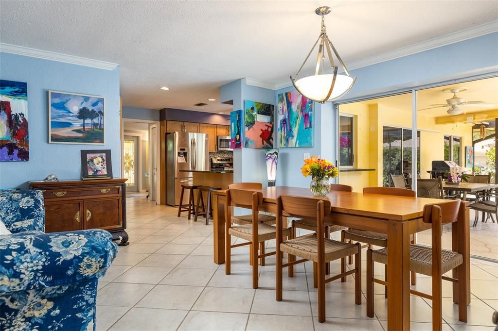 The Dining Room is large and features Sliding Doors out to the Lanai, PERFECT for entertaining!