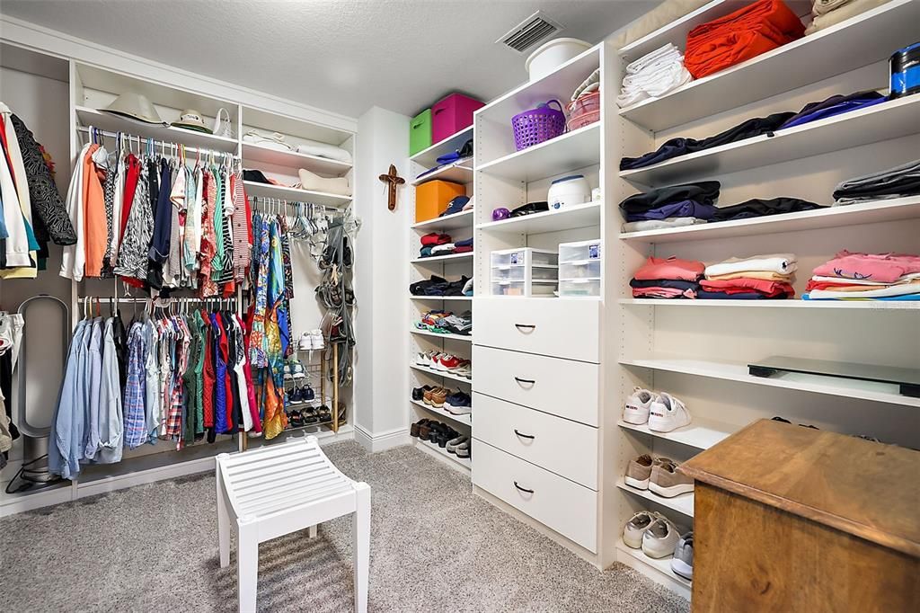 Amazing closet organizer system in this walk-in closet ~