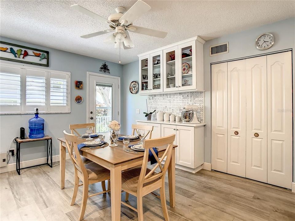 The Kitchen upgrades including 42” soft close white cabinets and striking quartz countertops with a raised breakfast bar. The stainless-steel appliances include Kenmore Elite convection oven, hood, refrigerator, dishwasher, and a wine refrigerator