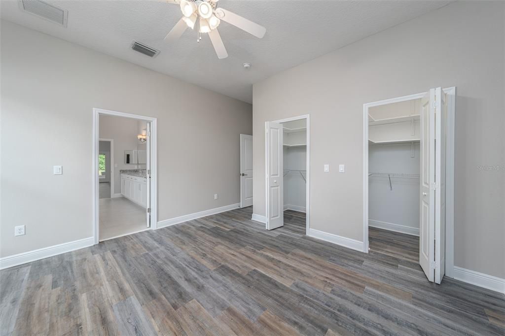 Two walk in closets in this secondary bedroom!