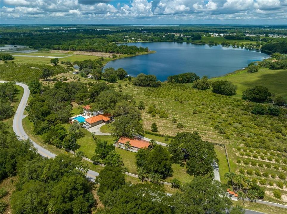 AERIAL SHOWING VILLA, EAST LAKE, AND AIRPORT,GROVE