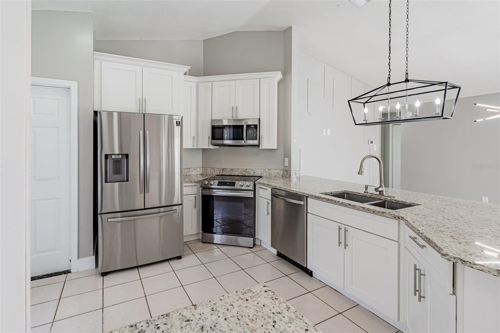 GORGEOUS, updated kitchen with granite and high-end stainless steel applainces