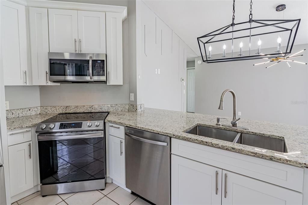 GORGEOUS, updated kitchen with granite and high-end stainless steel applainces