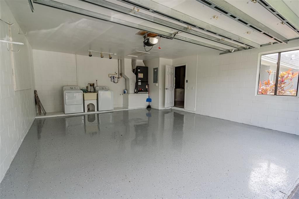 Garage with epoxy painted flooring.