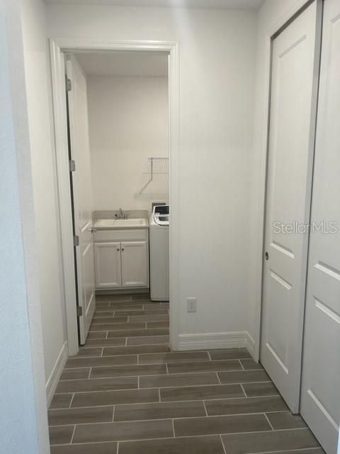 Closet Storage & Entrance to Laundry Room