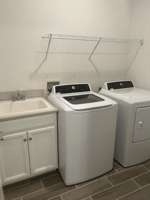 Laundry Rm, Washer, Dryer & Utility Sink included