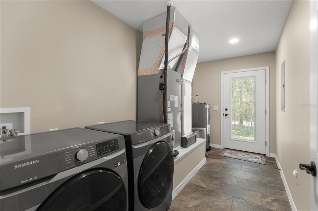 Inside Laundry - Washer and Dryer for both homes convey