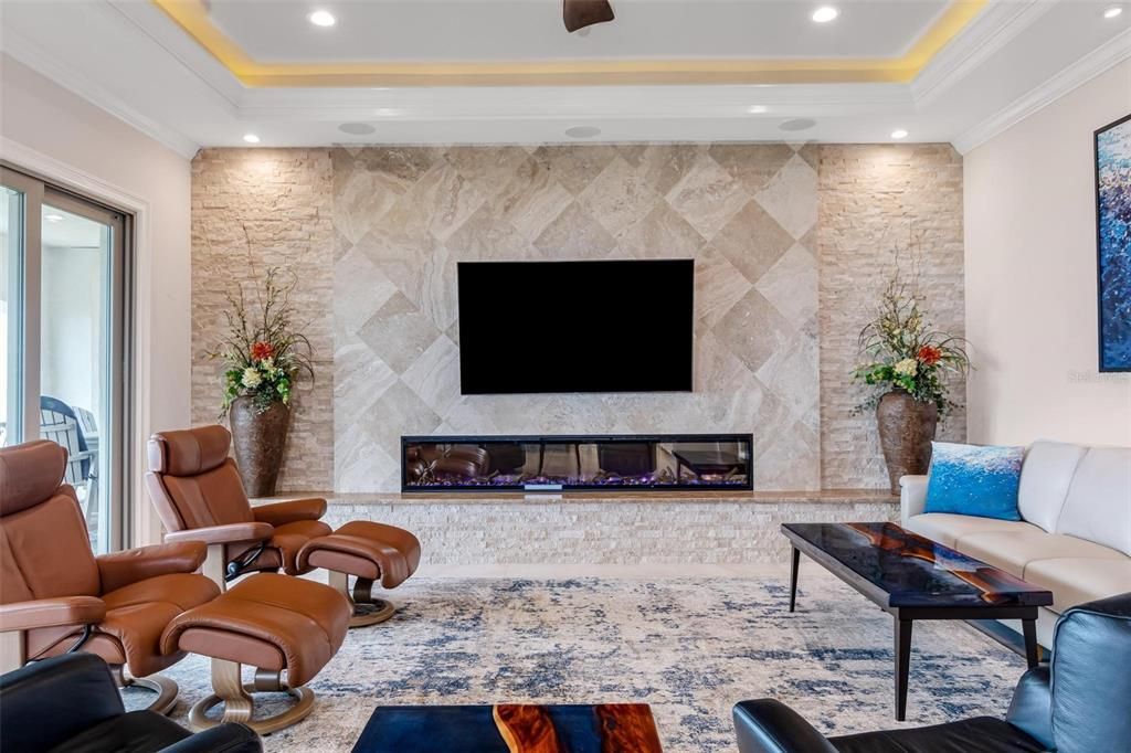 3rd Story Living Room with Travertine Fireplace