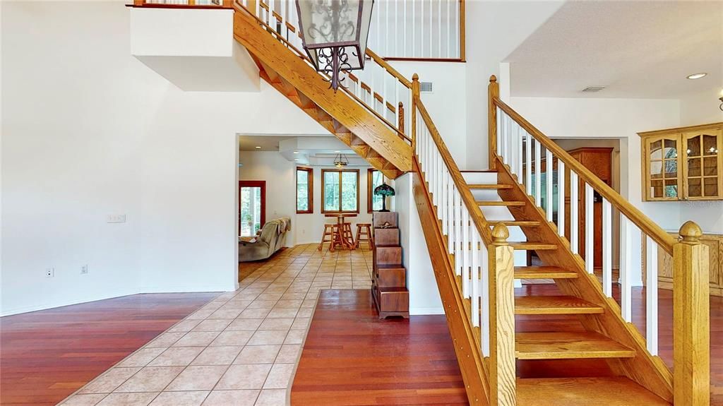 Entryway with stairs leading to the second story.