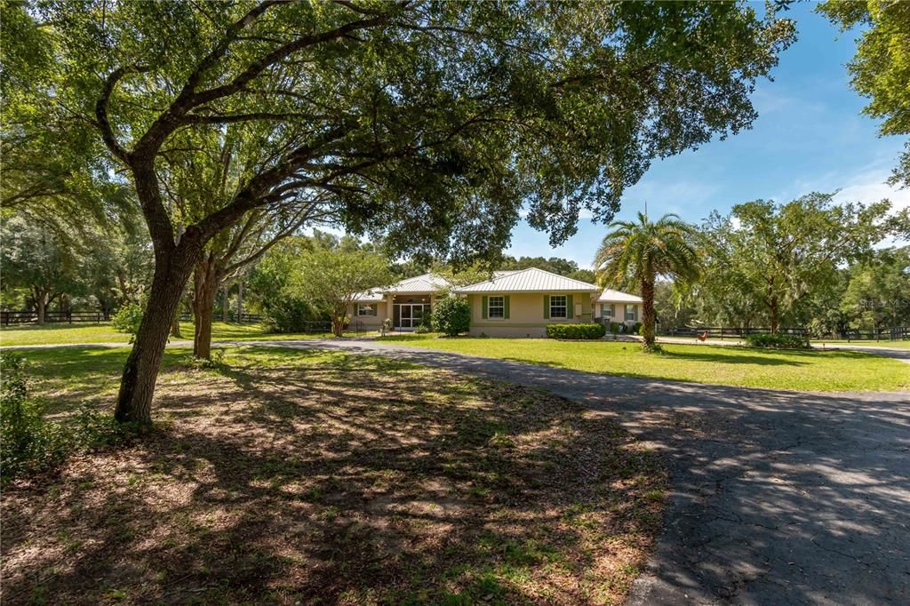 FRONT OF HOME AND CIRCULAR DRIVE