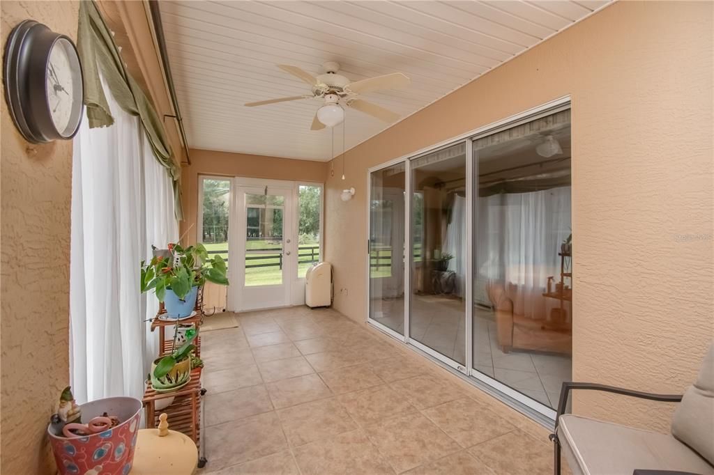 FLORIDA ROOM DOORS TO OUTSIDE AND FAMILY ROOM