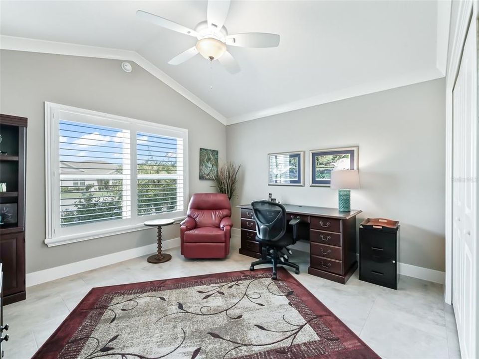 Front Guest Bedroom with Vaulted Ceilings & Large Closet.