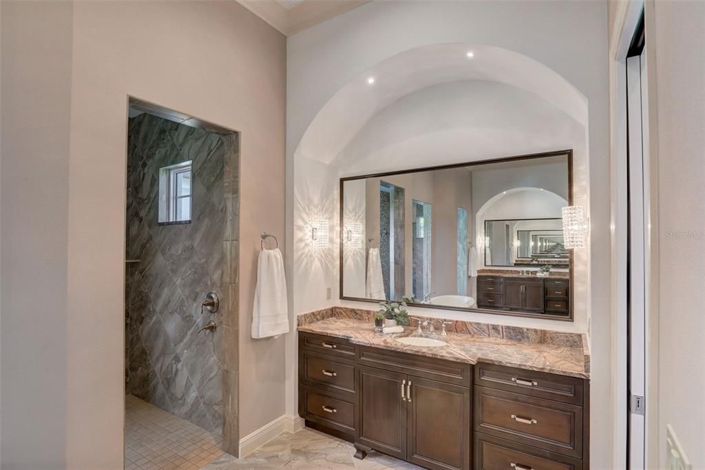 2 water closets and 2 separate sinks both across from each other