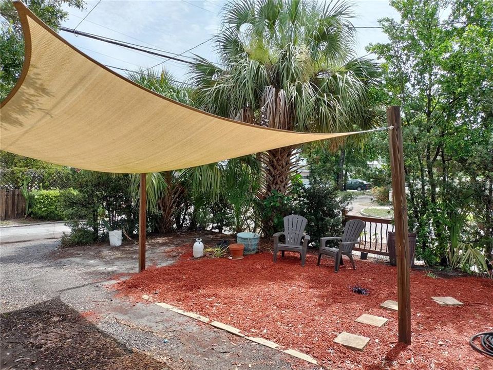Sun shade parking area from the rear alley