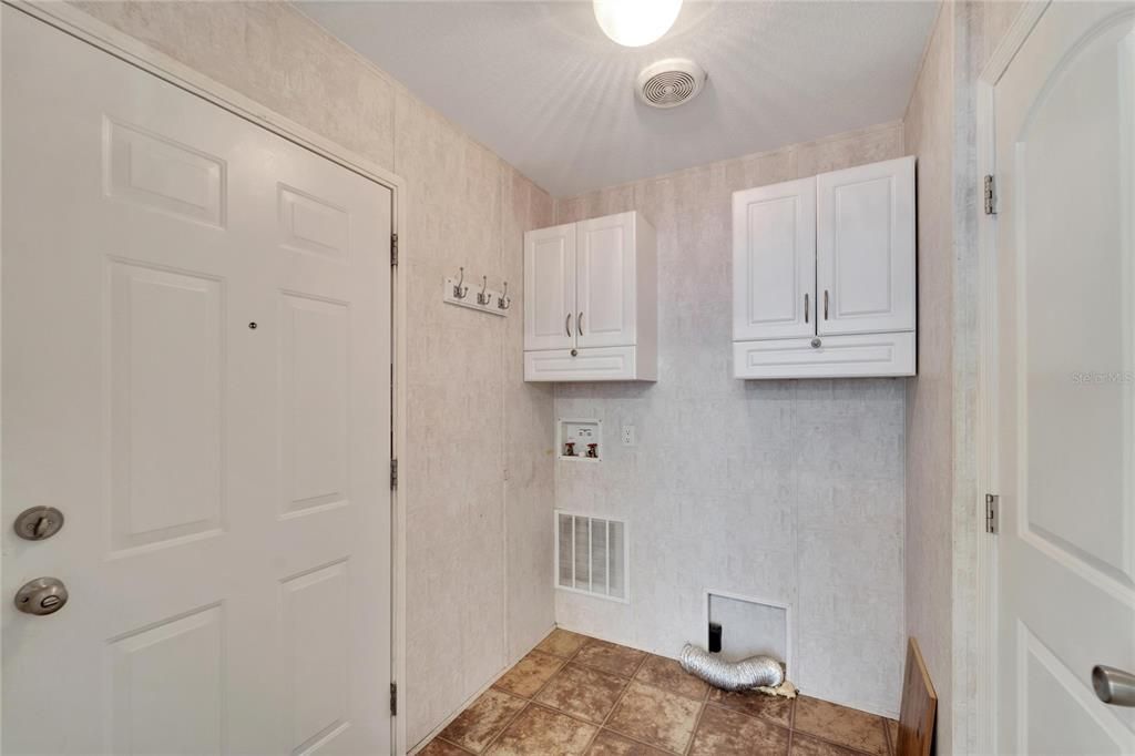 Laundry room and rear exit to the screened back porch