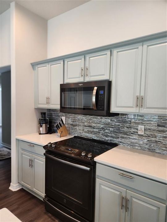 Very stylist cabinets and backsplash