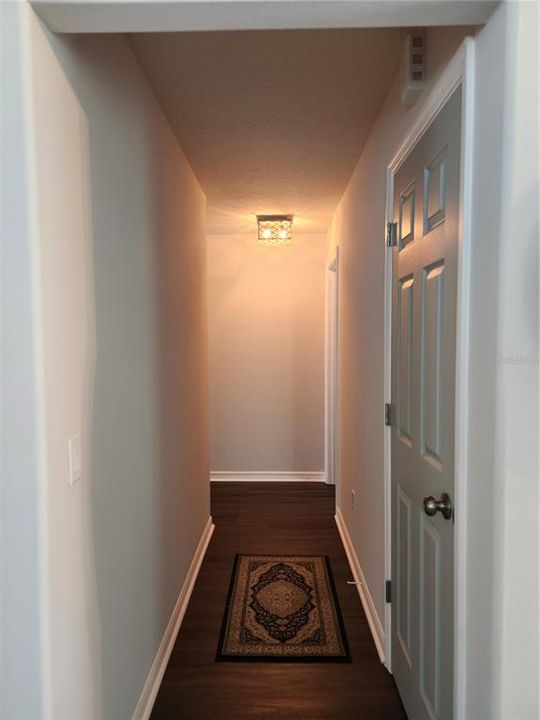 2nd hallway with coat closet