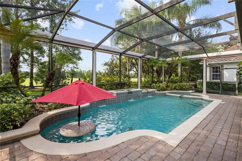 Gorgeous pool with built in waterside table!