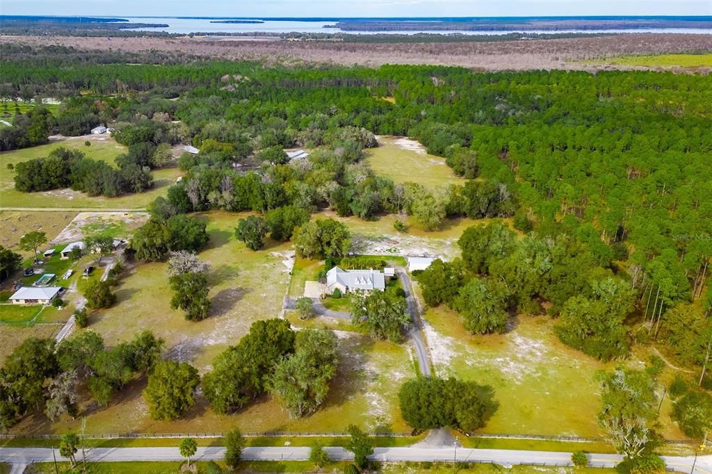 Aerial showing home with Crescent Lake Conservation Area