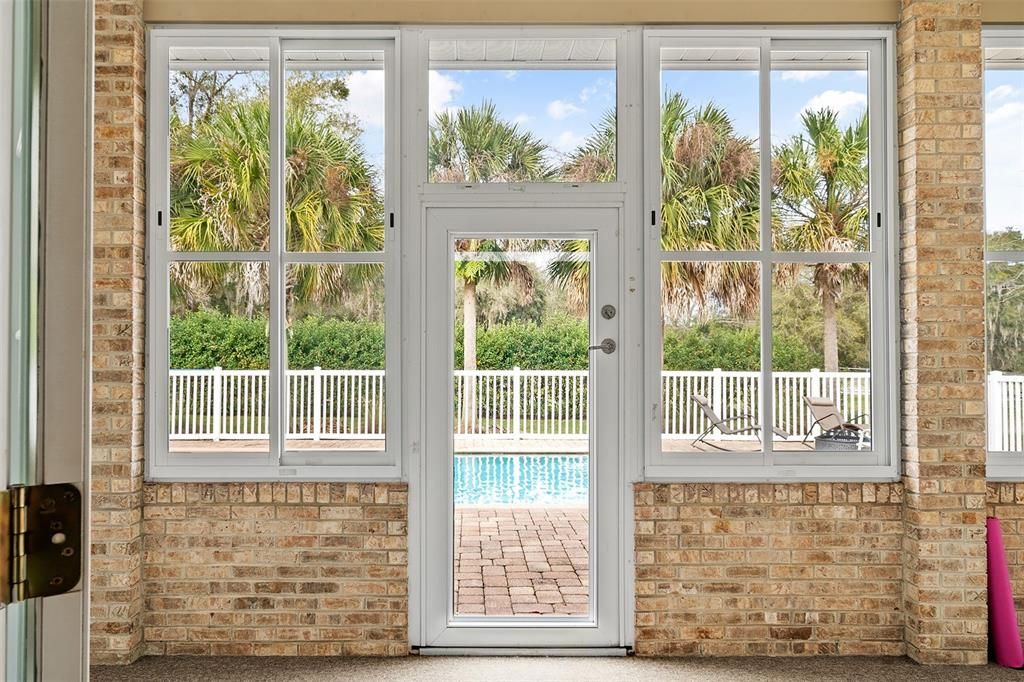 Sunroom door to pool and backyard