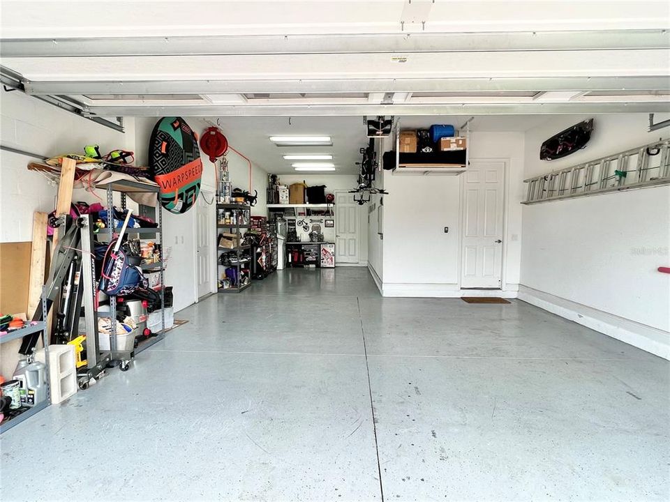 Oversized 3 car tandem garage garage allows for boat parking, jet ski parking, or workshop.