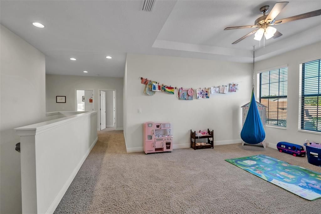 Upstairs loft to utilize as a play room, family room, or gaming room.