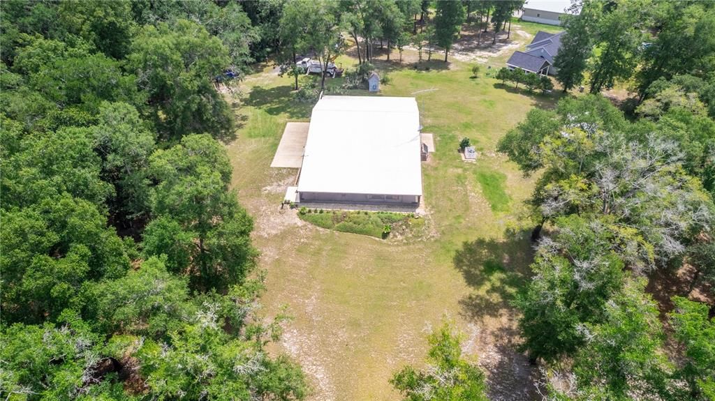 Aerial  of hangar home front side of the hangar apartment and screened porch.