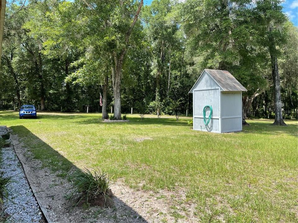 East side of property. The well house is close to end of the property between neighbors that are to the irght.