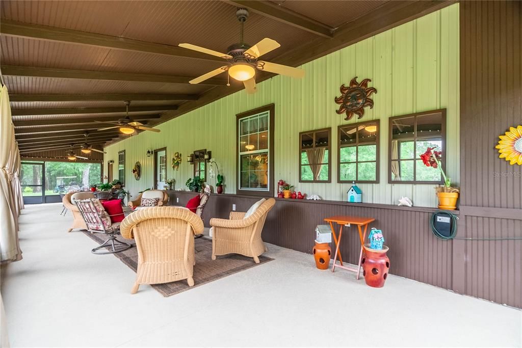 Decorative ledge along the front of the home is a great place for collectables and holiday décor. The three small mirrored windows to the right are decorative accents not functioning windows.