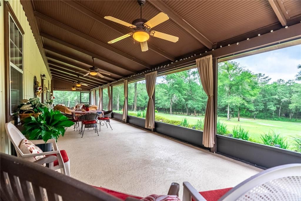 Lovely scenic view on the porch looking toward the South and West. This is privacy at its best!