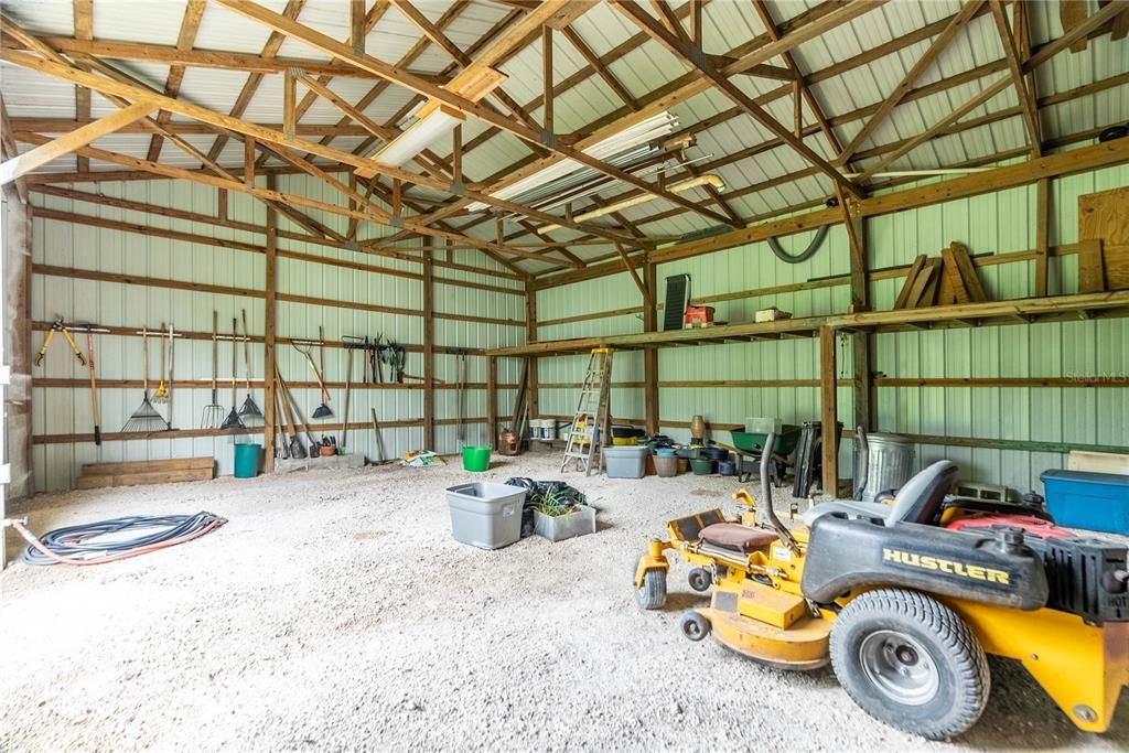 Look at all you can store in this shed with a lime rock based floor. Tractors. Mowers, ATV's.