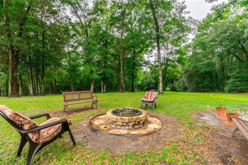 The fire pit looking toward the North. The land in this area is at a high elevation and would be a great place to built a larger main house.