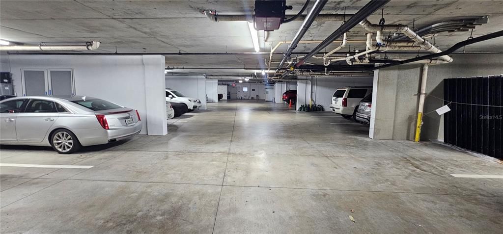 View of Garage. With assigned parking.