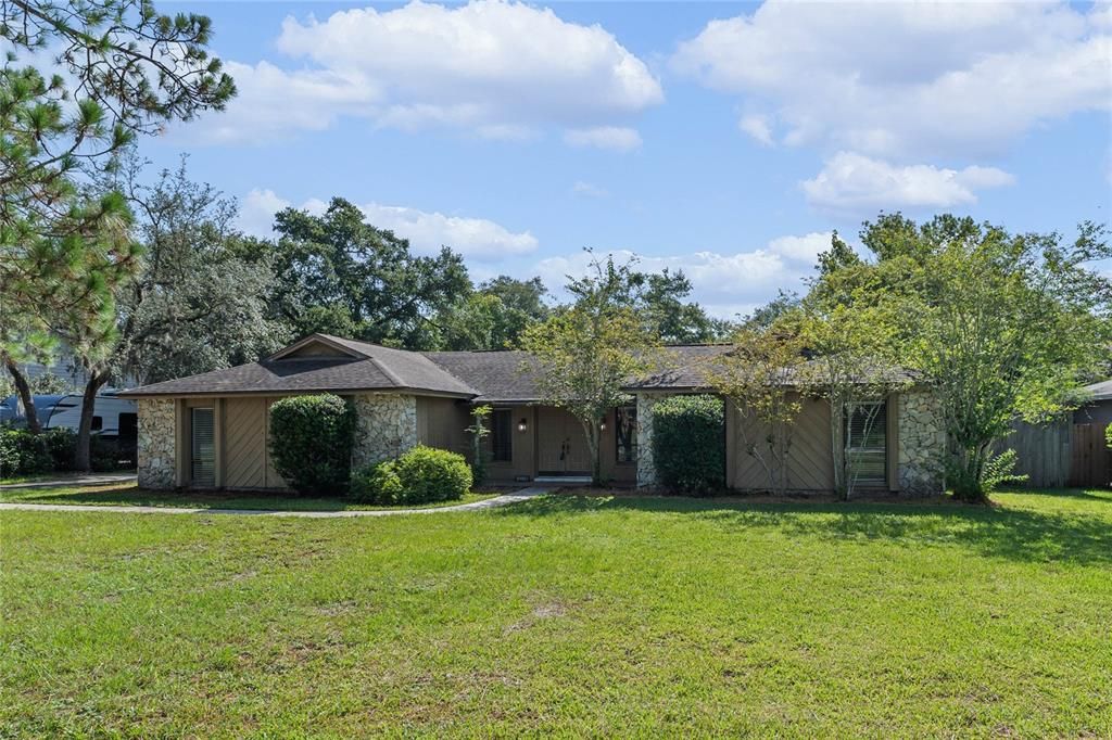 Pool home in the heart of Tuscawilla situated on .46 acres.