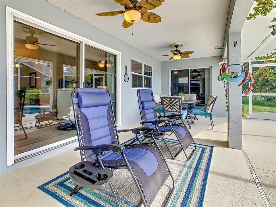 Covered lanai area.  Sliding glass doors make access between the home and lanai easily accessible