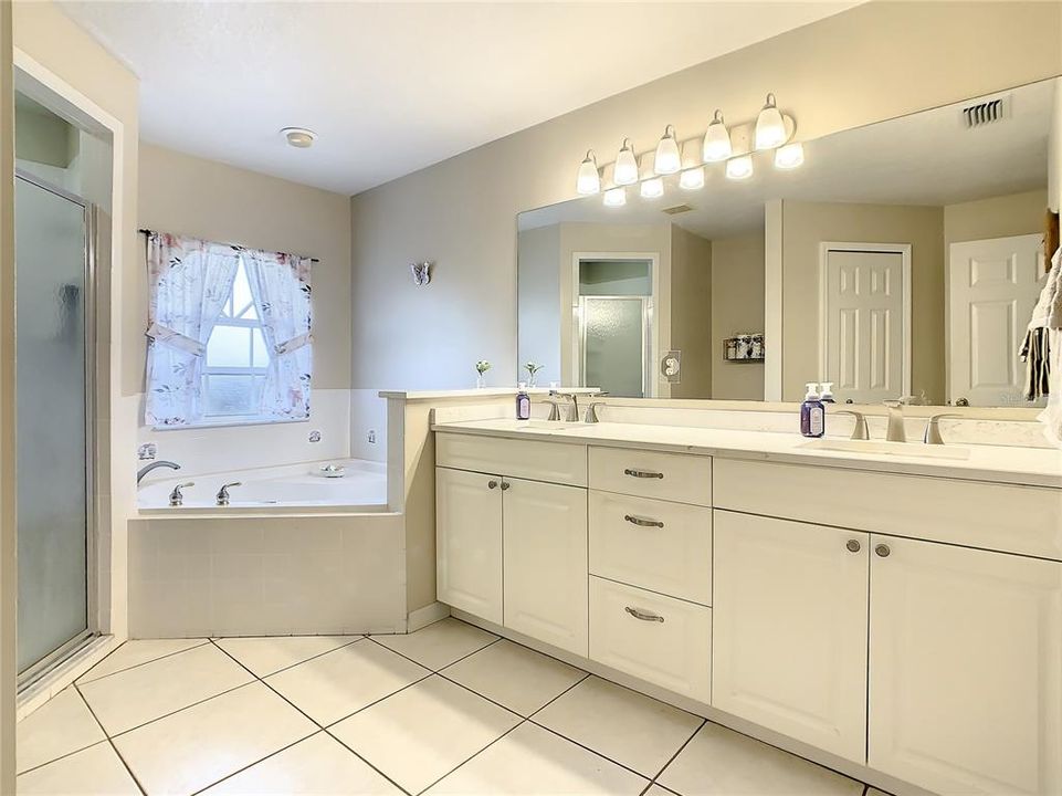 You will love this master bathroom with soaking tub and walk-in shower.  Vanity has 2 sinks and plenty of countertop space.