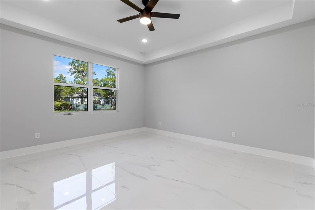 Master Bedroom - Large window providing natural sunlight