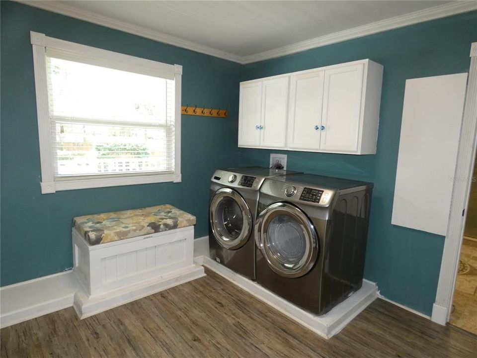 Upstairs Walk In Closet with Laundry