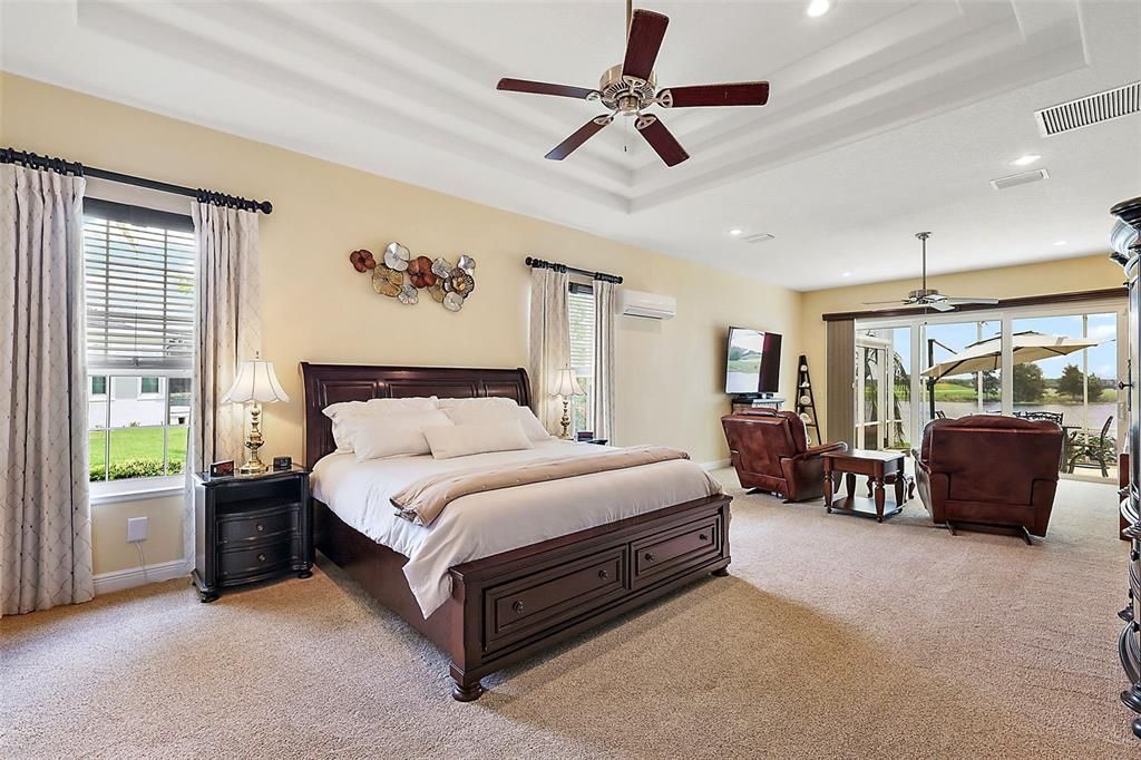 Master bedroom w/tray ceiling & sliders to lanai