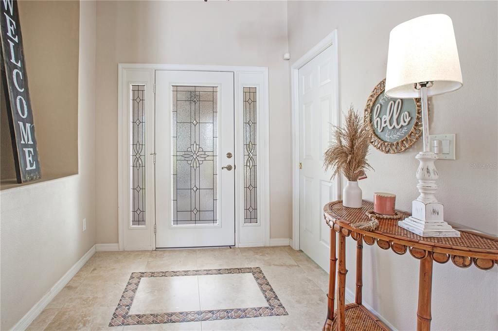 Nice Entryway with Decorative Tile to Accent